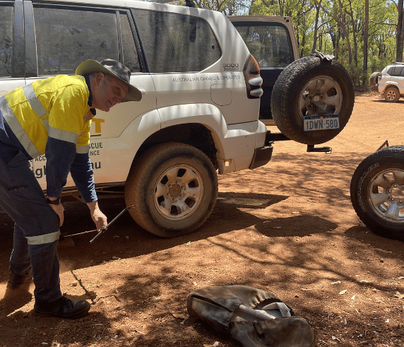 Saferight training instructor for the Saferight course 4WD demonstrating an aspect of the course conducted outside.