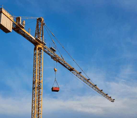 Tower Crane Ticket Perth - Tower crane in operation lifting a load against a clear blue sky during Saferight's Tower Crane operation training
